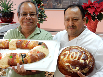 Porfirio Armenta with rosca de reyes, left; Martin Rojas with vasilopita, right.
