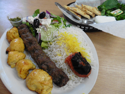 Plate with Koobideh and Joojeh kabobs, roasted over open coals.