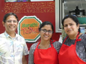 Sandeep Padhye (left) and wife Aparna Padhye (center) with teammate Amruta Deshpande.