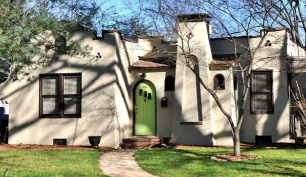 Rare around here but common in the southwestern U.S., the flat roof, stucco walls and arches recall the Spanish adobe haciendas of Mexican-era California. "My Adobe Hacienda" became a popular love song on the new-fangled radio shortly after this house was built in the late 1920s.