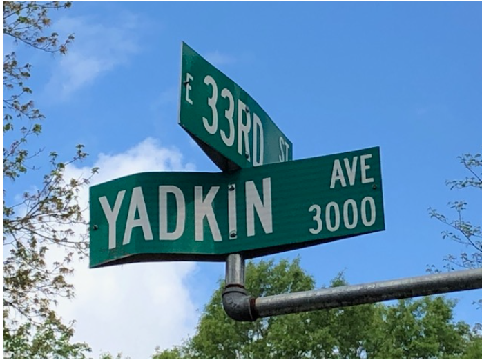 The street name honors the Yadkin River, which had powered one of the South’s earlier experiments with electricity, the 1898 Idols dam that supplied current to mills around Winston-Salem. It’s one of several textile-inspired street names in NoDa, including Warp and Card (two textile processes) and Charles, Holt and Spencer (for mill owners Charles Worth Johnston, William Holt and Jesse Spencer)